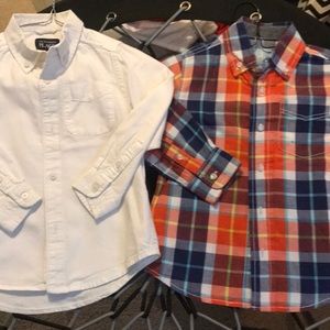Two button down boys shirts